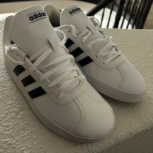 White and black adidas size 6 but fits like 7 1/2